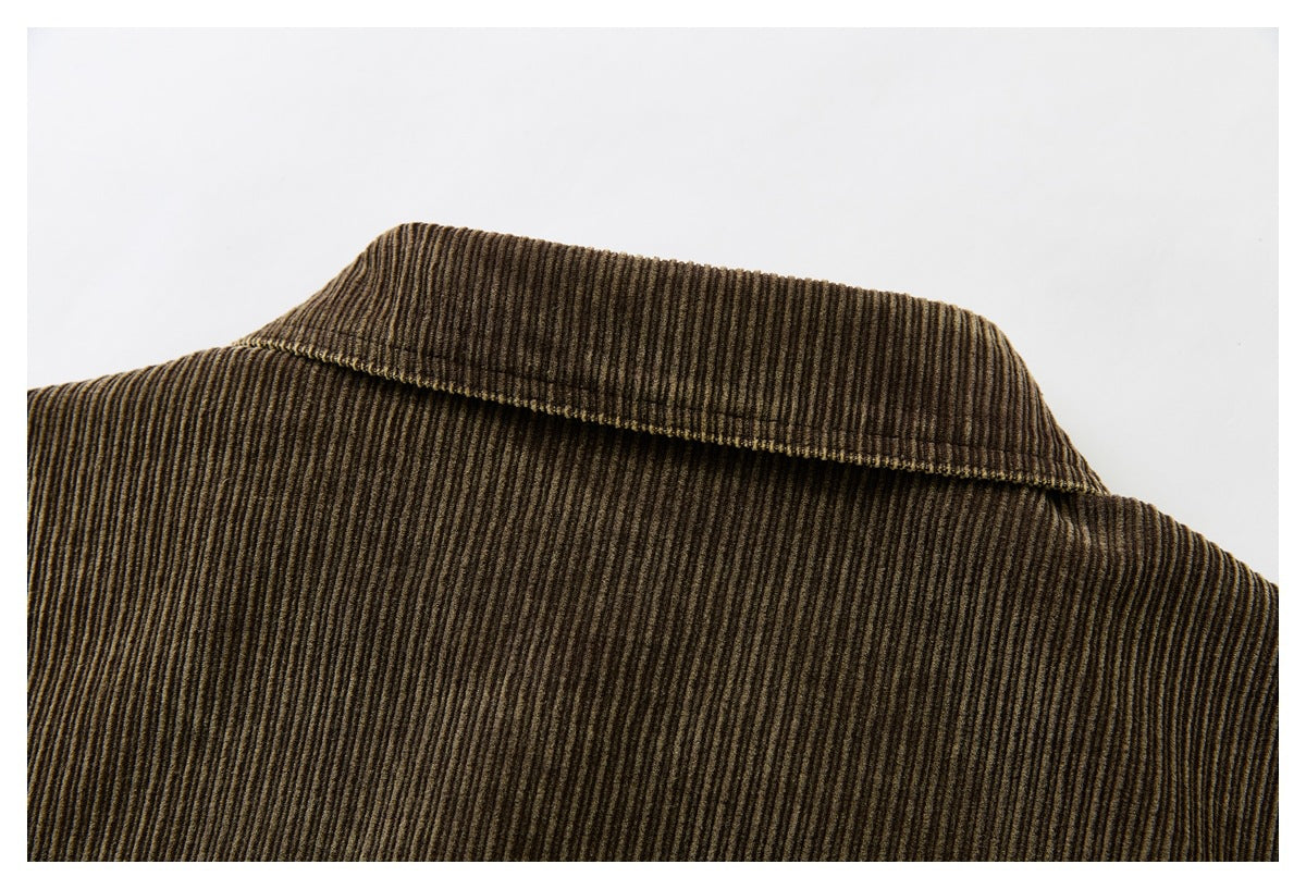 Close-up of the brown corduroy jacket’s collar and upper back.