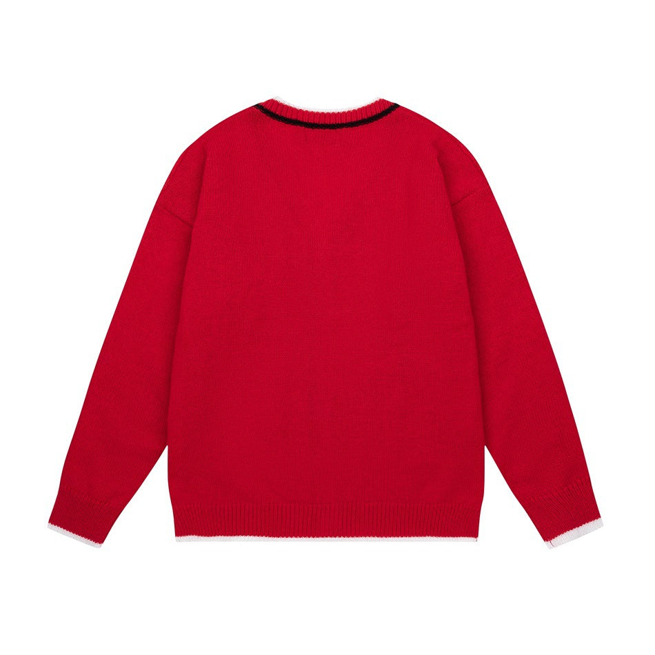 Flat back view of a red cardigan with long sleeves and white trim at the collar, cuffs, and hem.