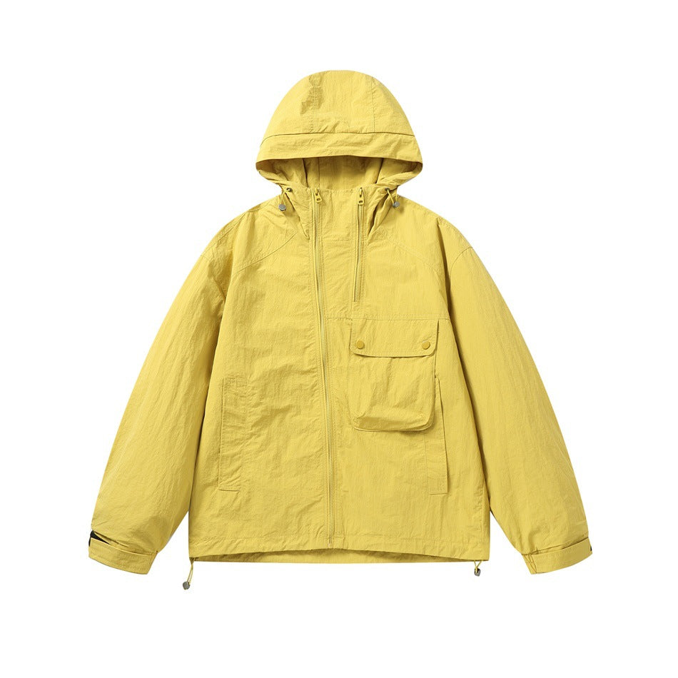 Front view of a yellow hooded jacket with a front zipper, snap-flap pocket, and drawcord hem.