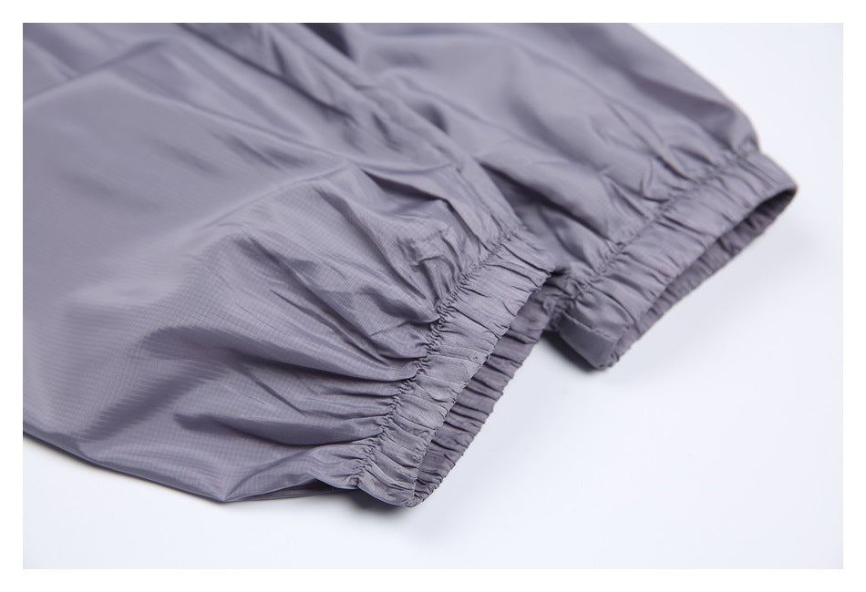 Close-up of the gray-purple jacket's gathered elastic cuff.