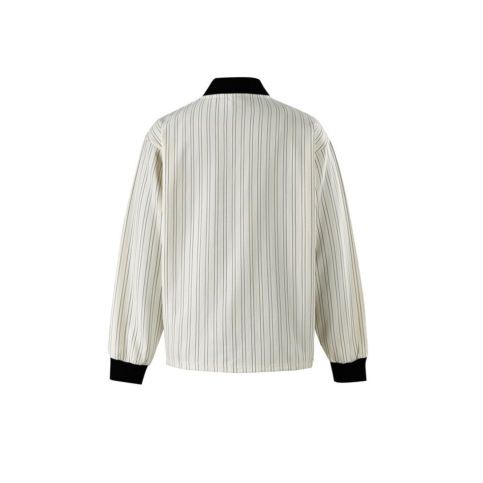 Back view of a cream jacket with fine dark pinstripes, a black collar, and black cuffs.