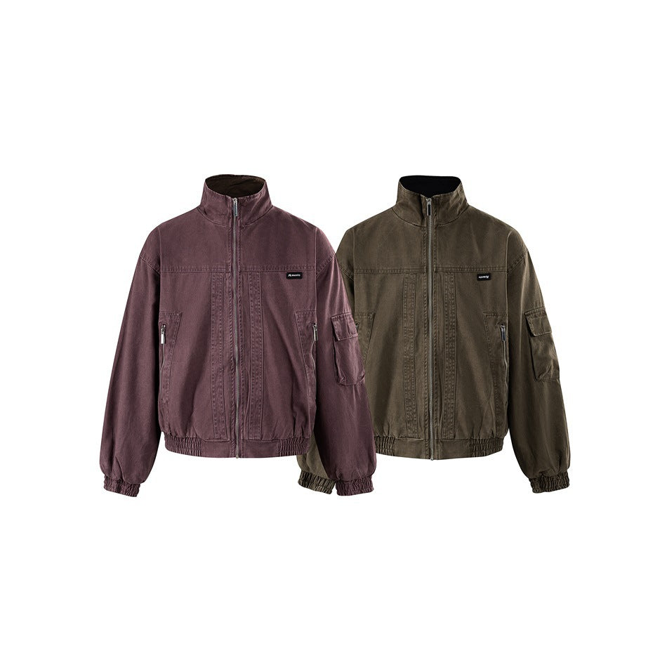 Front view of two zip-front jackets with stand collars, elastic cuffs and hems: one plum and one olive brown.