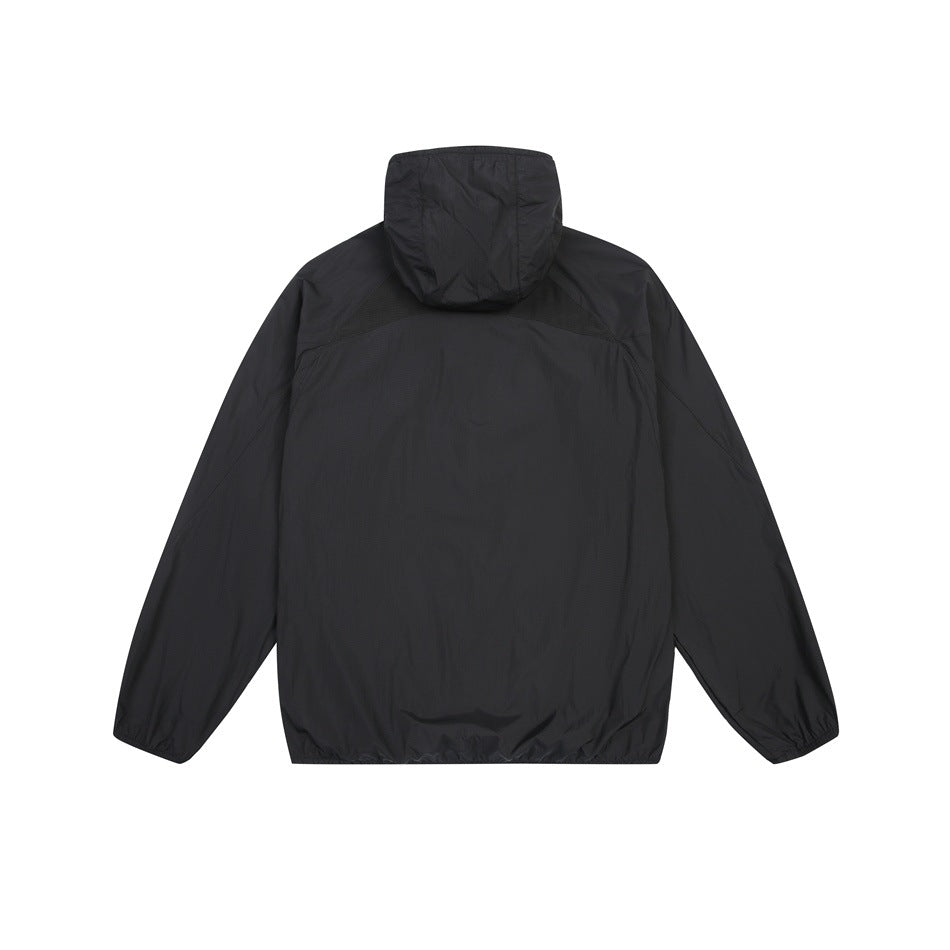Back view of a black hooded jacket laid flat against a white background.