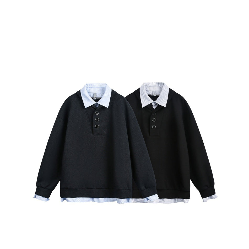 Two pullovers arranged side by side in charcoal and black, each with a shawl collar, button placket, and pale shirt collar