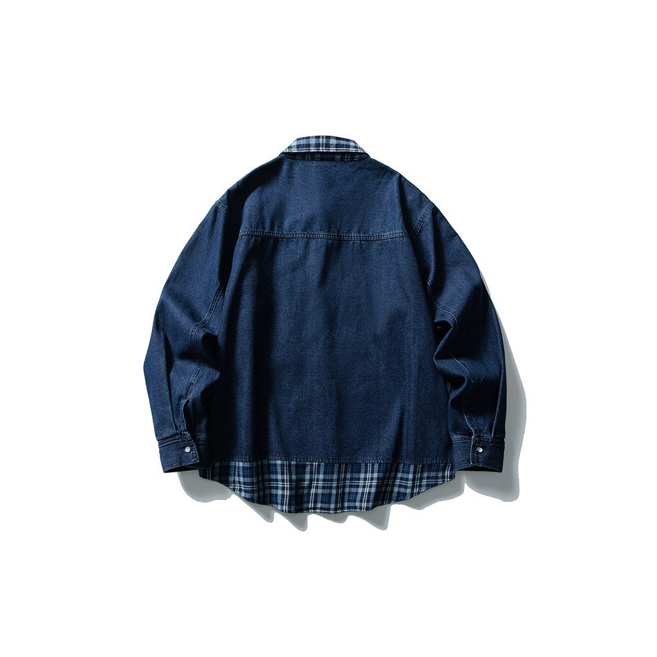 Back of a dark blue denim overshirt with blue plaid collar and hem, displayed flat against a white background.