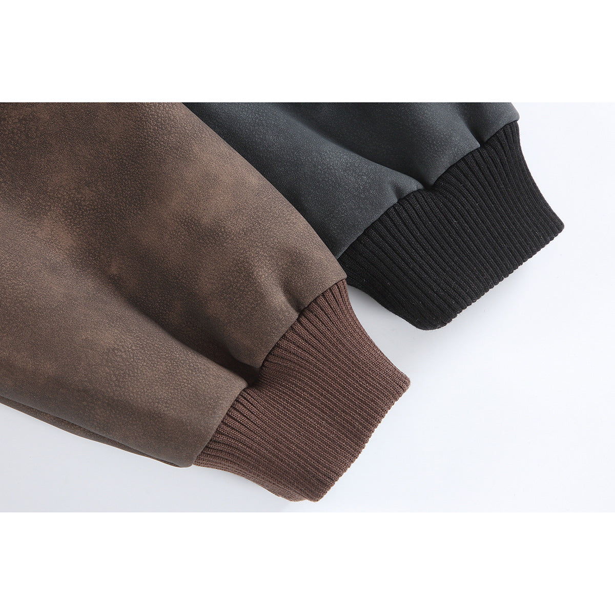 Close-up of brown and charcoal jacket sleeves with contrasting ribbed cuffs.