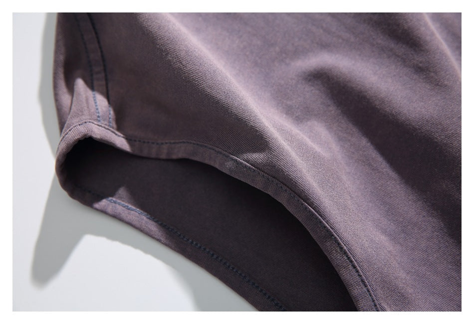 Close-up of the sleeveless shirt's armhole binding and stitching.