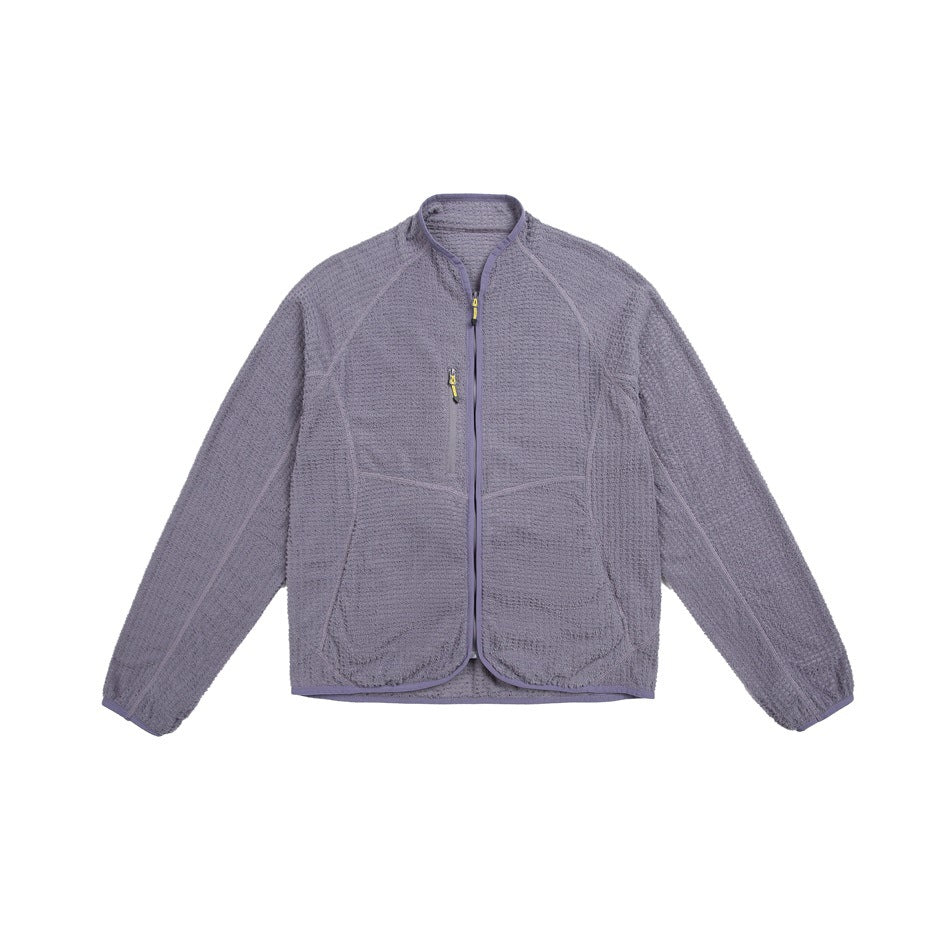 Purple textured fleece-style zip jacket with raglan sleeves, chest zip pocket and matching edge binding, flat front view