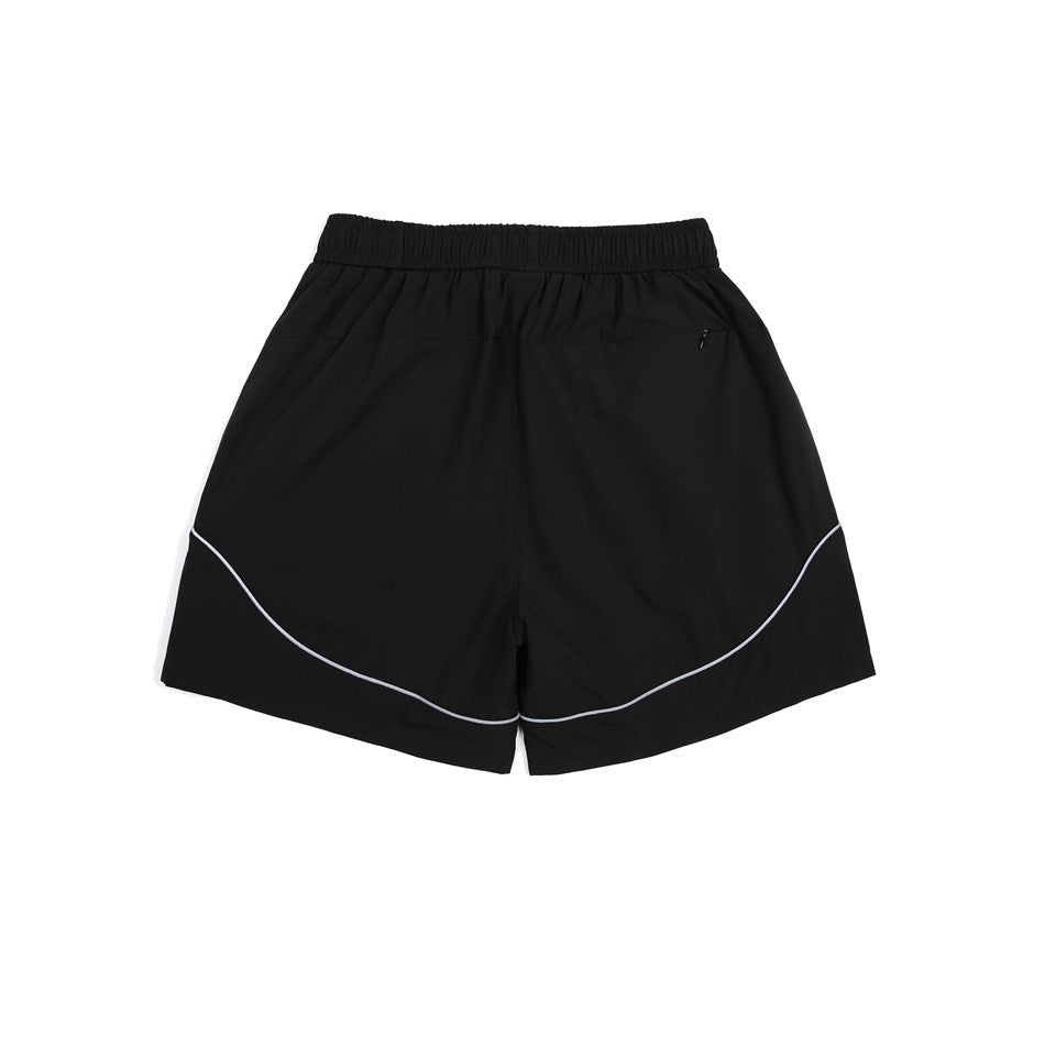 Black athletic shorts, back view, with an elastic waistband, small zip pocket, and curved white piping.