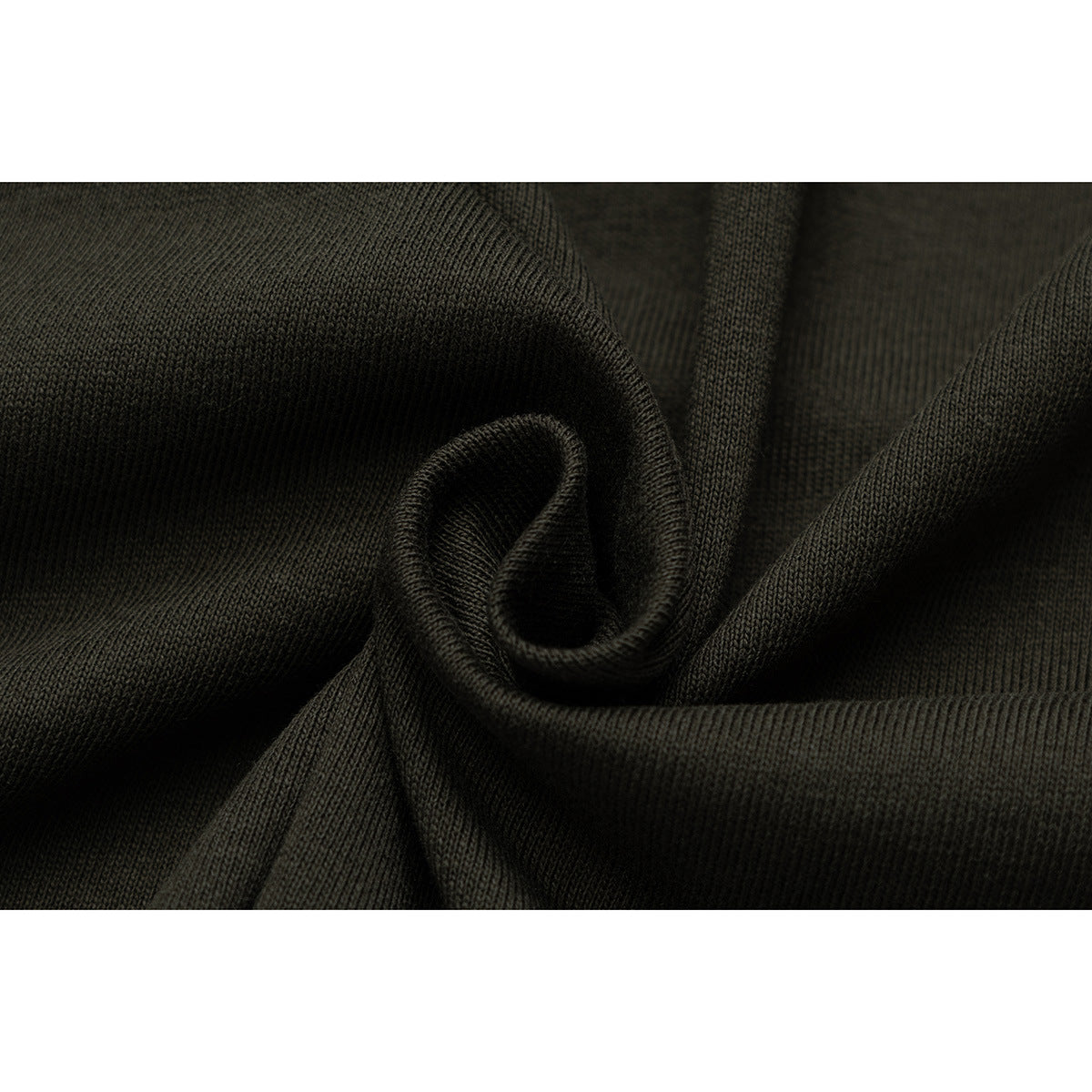 Macro view of dark olive knit fabric gathered into folds.