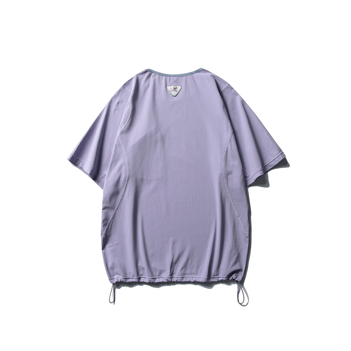 Back of a loose light lavender short-sleeve top with curved seams, a small neck label and drawcords at the hem.