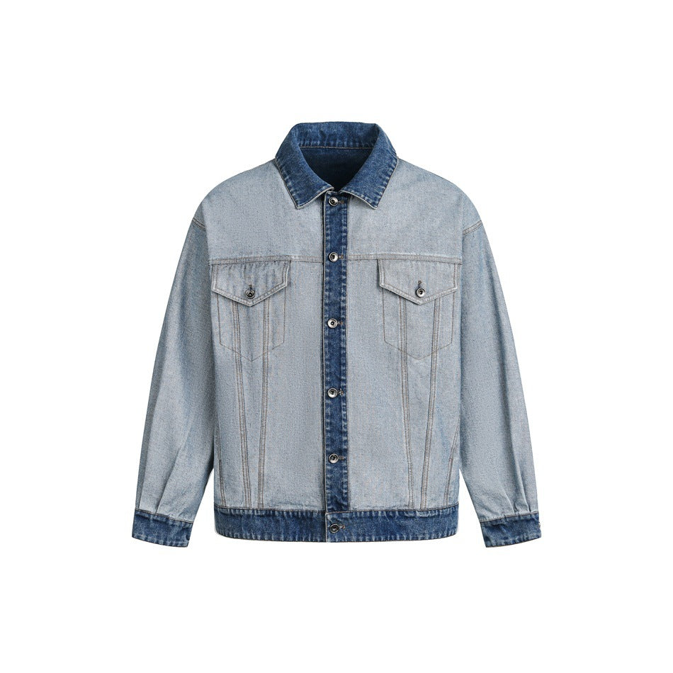Light blue denim jacket with darker blue collar, placket, cuffs and hem, shown flat from the front on white