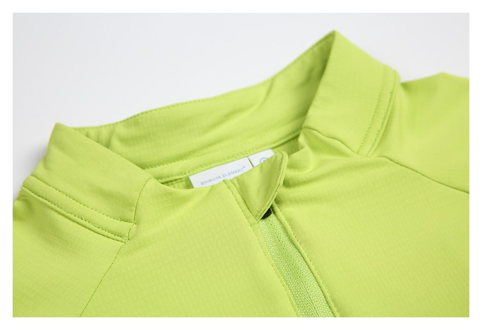 Close-up of the lime-green pullover's stand collar and upper quarter-zip opening.