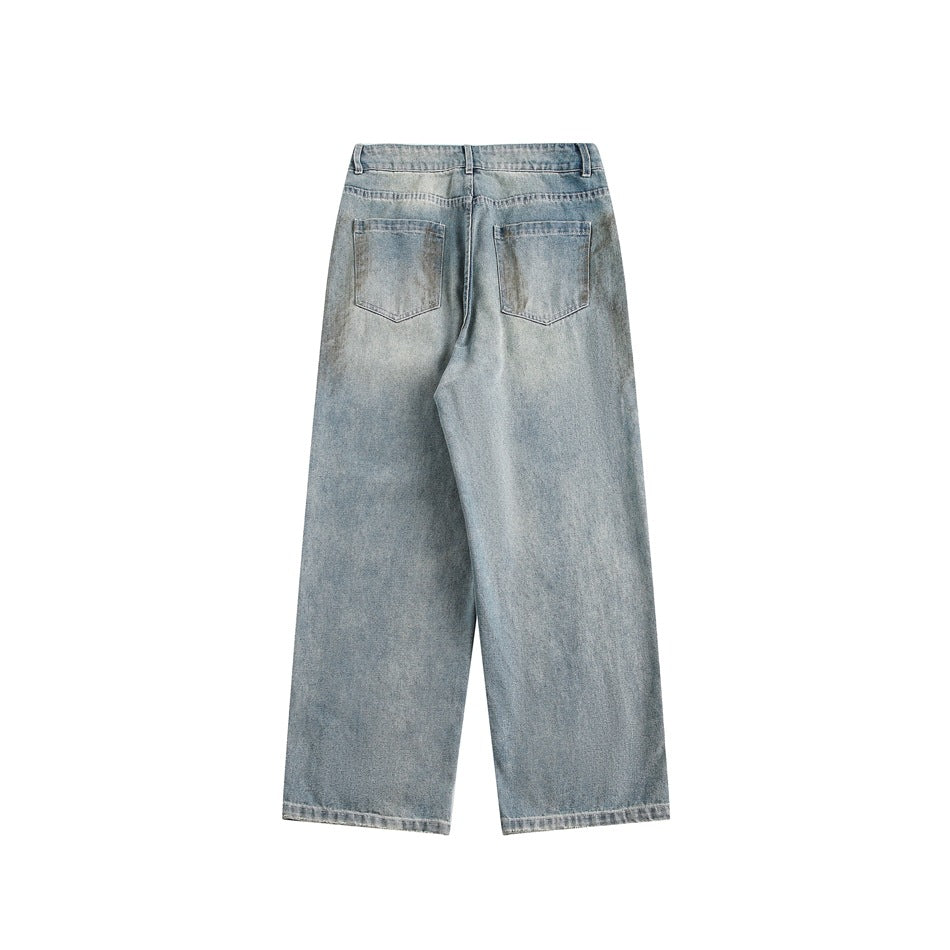 Back view of light-wash wide-leg jeans with two patch pockets, belt loops and straight hems.