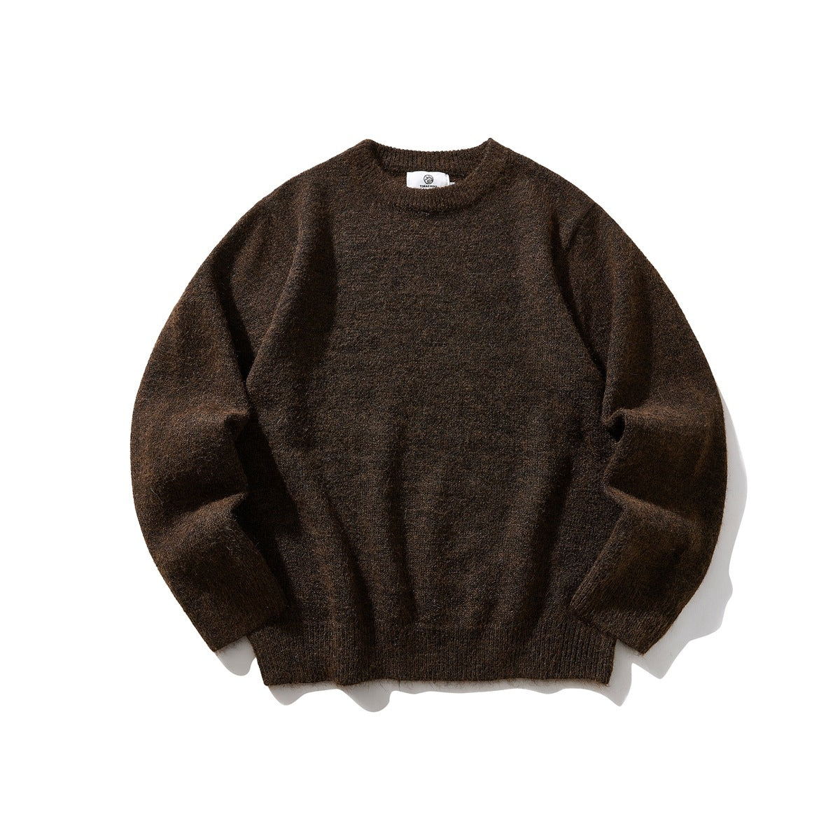 Dark brown brushed-knit crewneck sweater with ribbed collar, cuffs and hem, flat lay front view