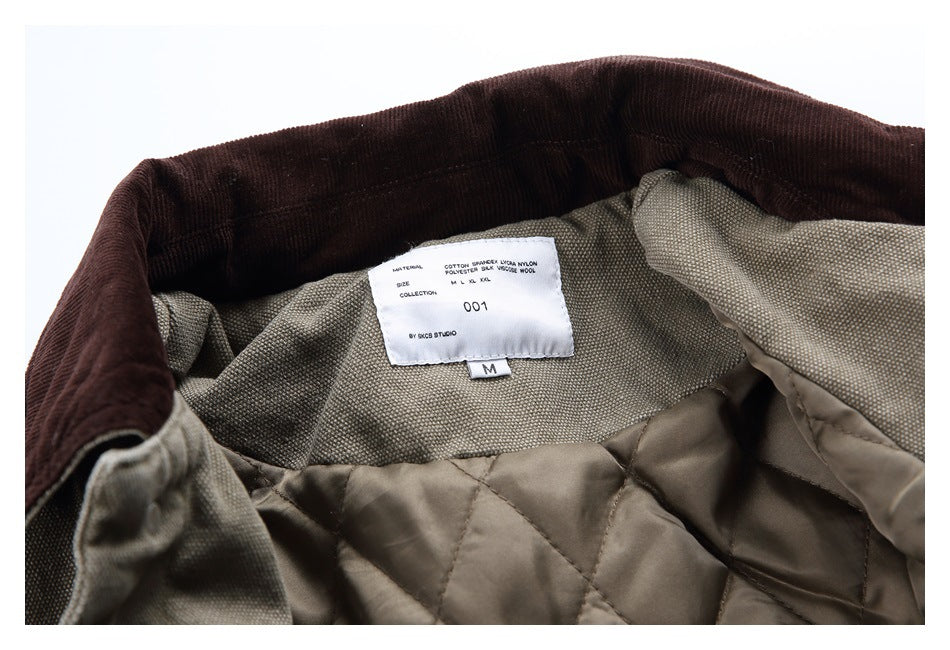 Close-up inside the olive jacket showing its quilted lining, dark brown collar, and sewn-in label.