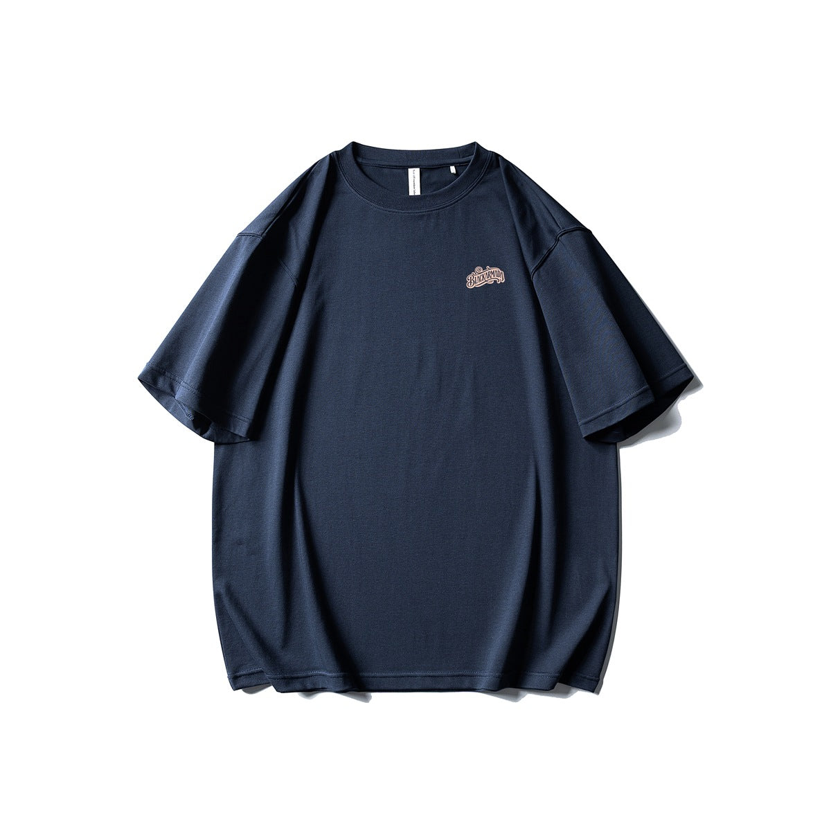 Front view of a navy oversized T-shirt with a small script logo on the chest.