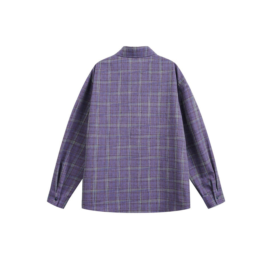 Back view of a long-sleeved purple plaid shirt with a collar and buttoned cuffs, laid flat on white.