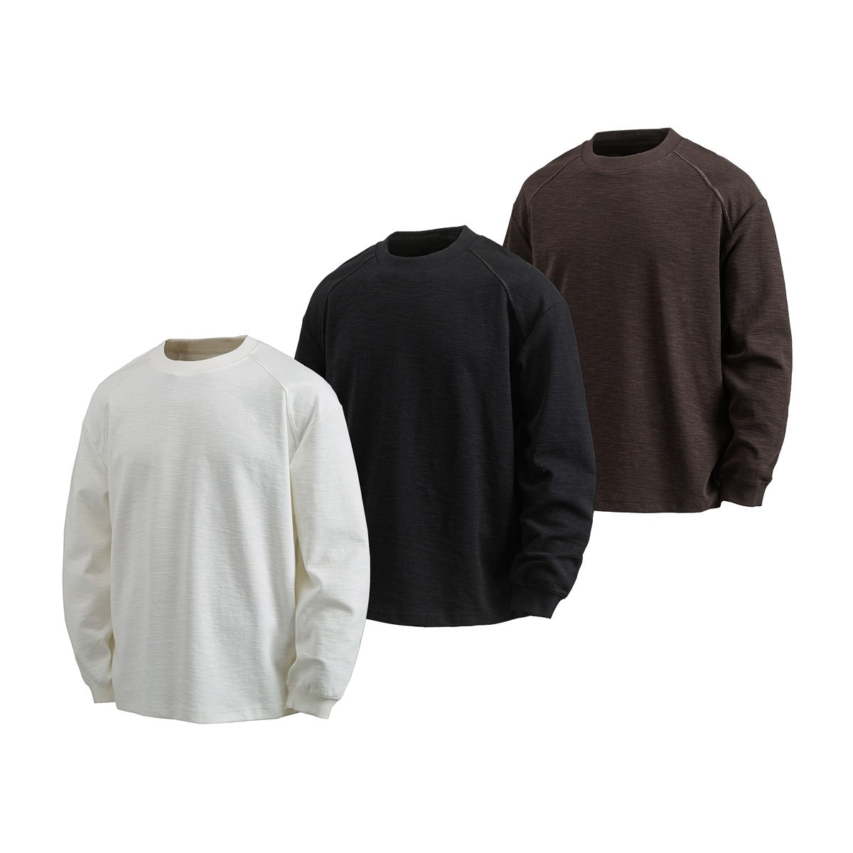 Three long-sleeve crewneck sweatshirts in white, black, and dark brown, shown from the front.