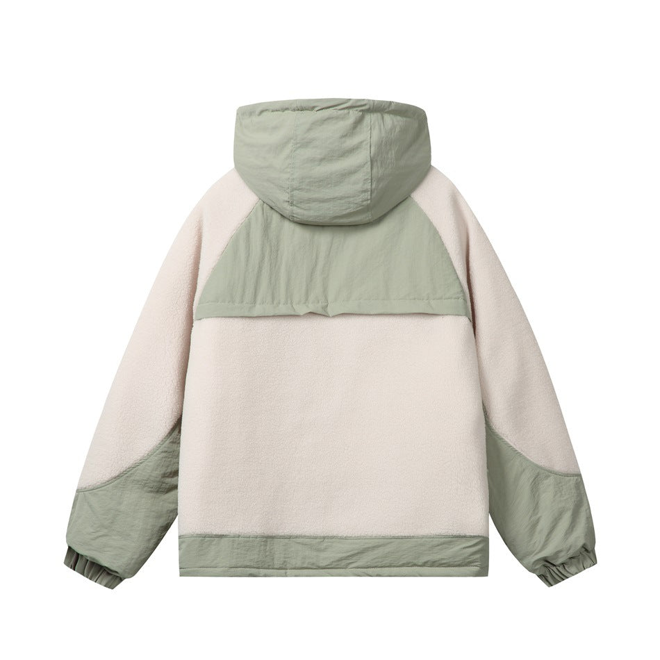 Back view of a cream and sage-green color-block hooded jacket with contrasting sleeve and hem panels.