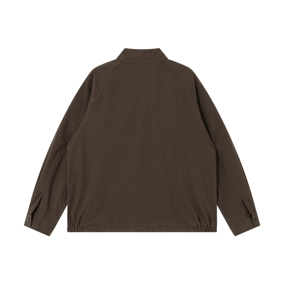 Brown jacket flat lay, back view with raglan seams, button cuffs and elastic hem