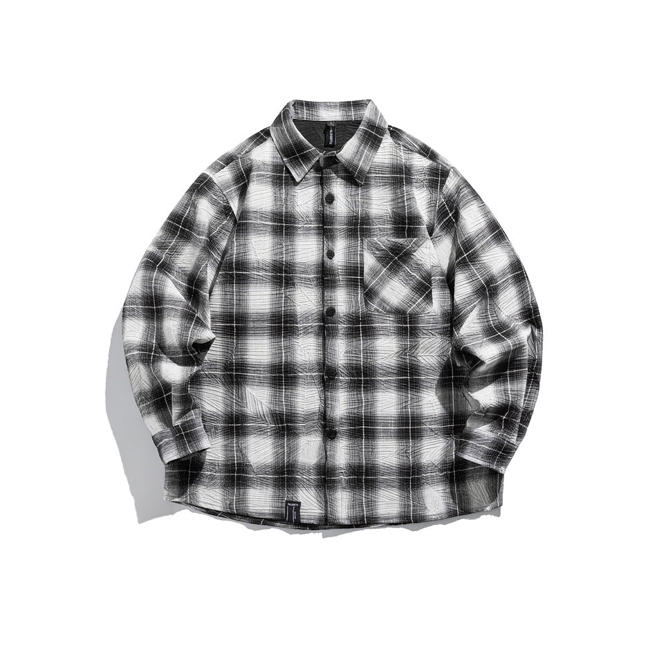 Black and white plaid long-sleeve button-up shirt with chest pocket, flat lay front view