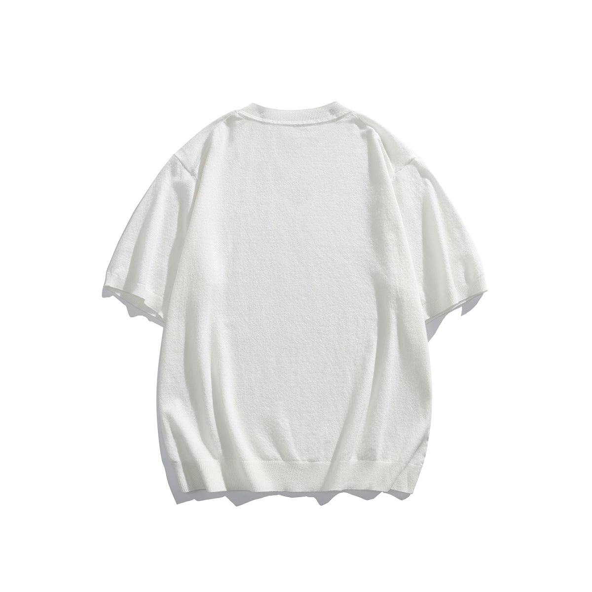 Back view of a plain white short-sleeve crew-neck knit sweater.