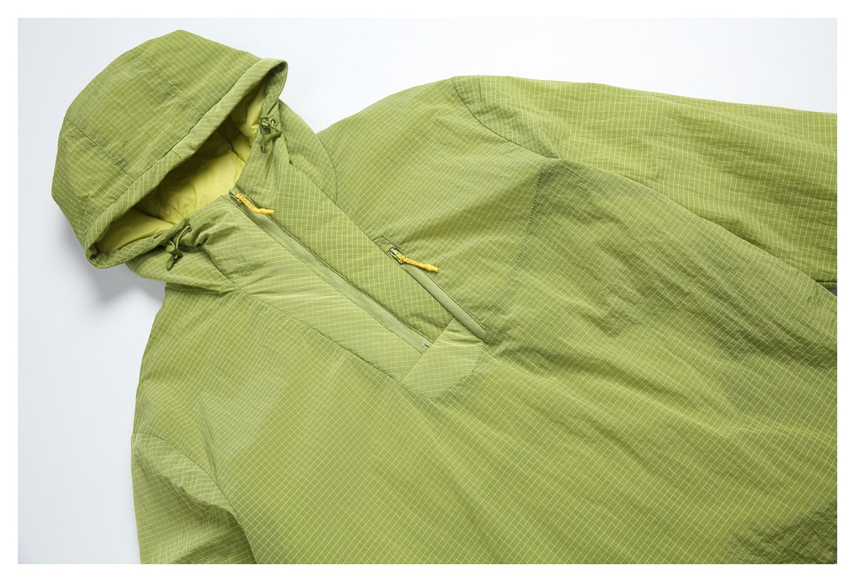 Angled close-up of a lime green grid-pattern hooded jacket, showing the hood, lining, and front zipper.