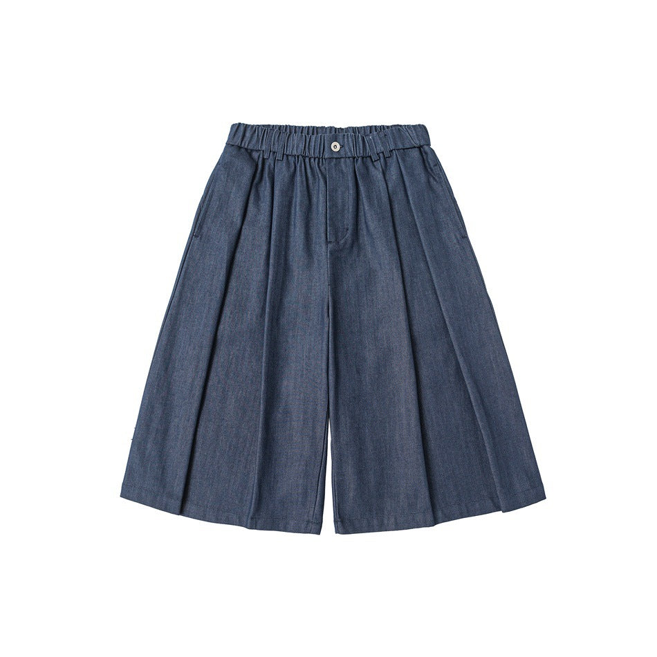 Blue denim-look wide-leg knee-length shorts with elastic waistband, button and pleats, flat lay front view