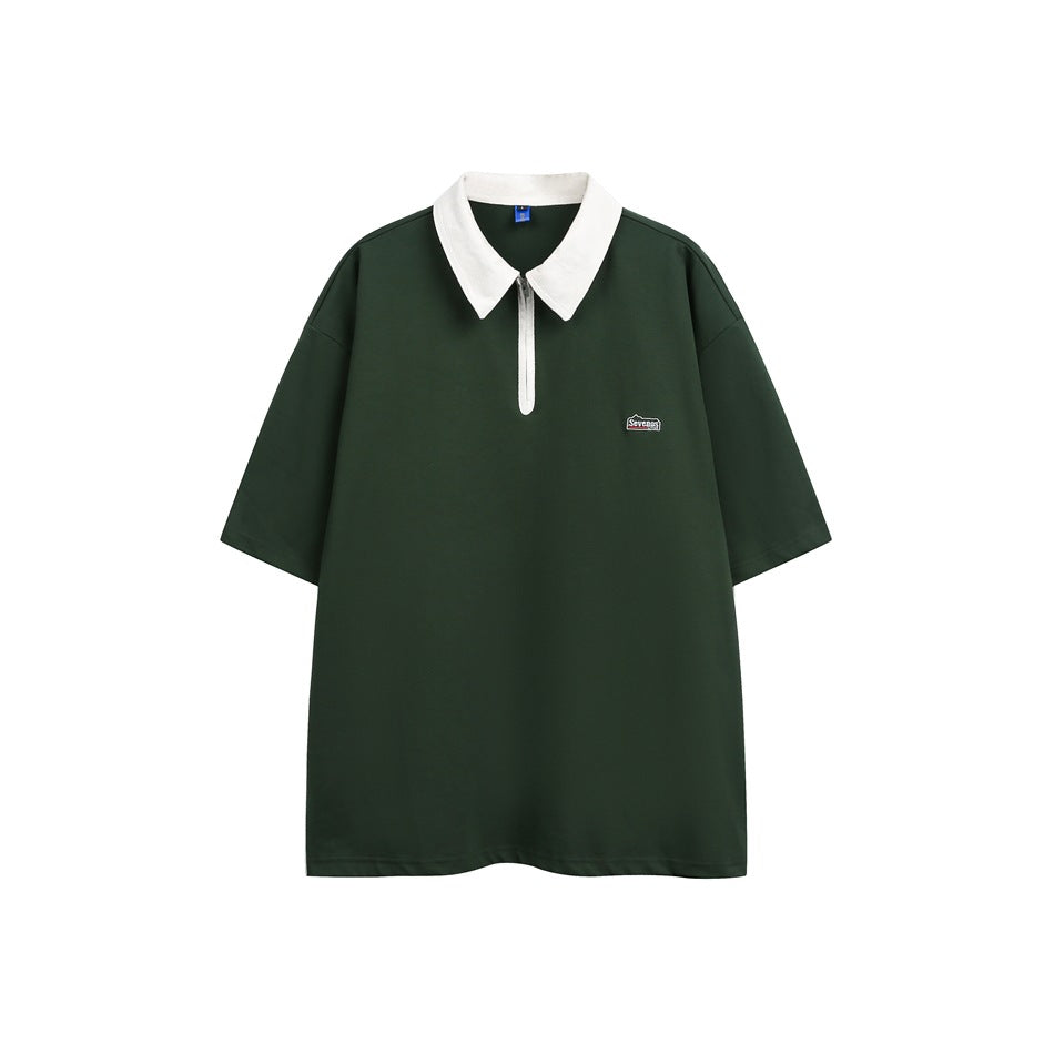 Army green short-sleeve quarter-zip polo top with a white collar and a small chest logo patch, front view