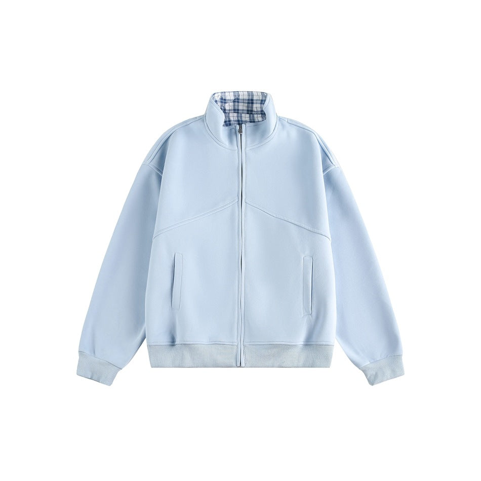 Light blue zip-front stand-collar jacket with blue plaid collar interior, ribbed cuffs and hem, and front pockets