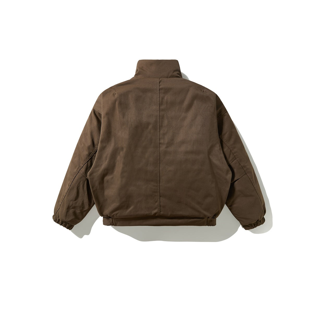 Back view of a dark brown cropped jacket with a stand collar, long sleeves, and gathered cuffs and hem.