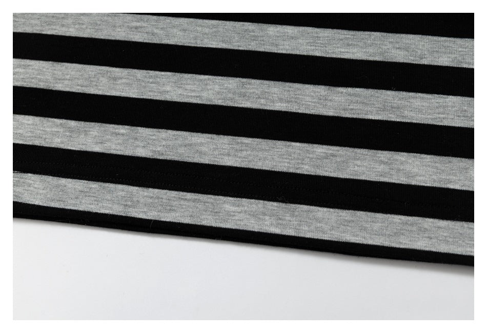 Close-up of alternating black and heather-gray stripes on the garment.