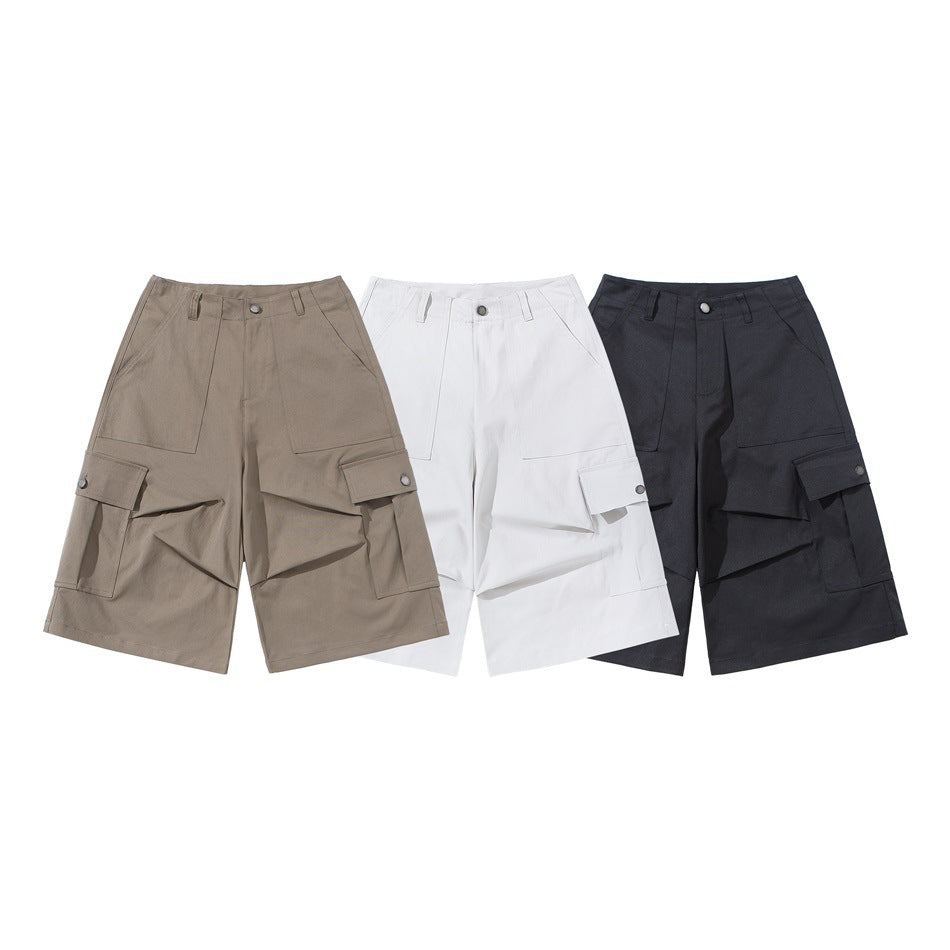 Three pairs of cargo shorts shown from the front in taupe, white, and dark charcoal.