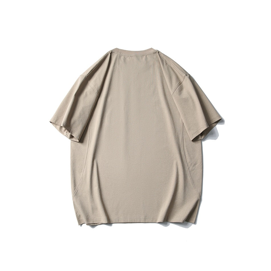 Plain light taupe oversized short-sleeve crew-neck T-shirt, shown from the back against a white background.