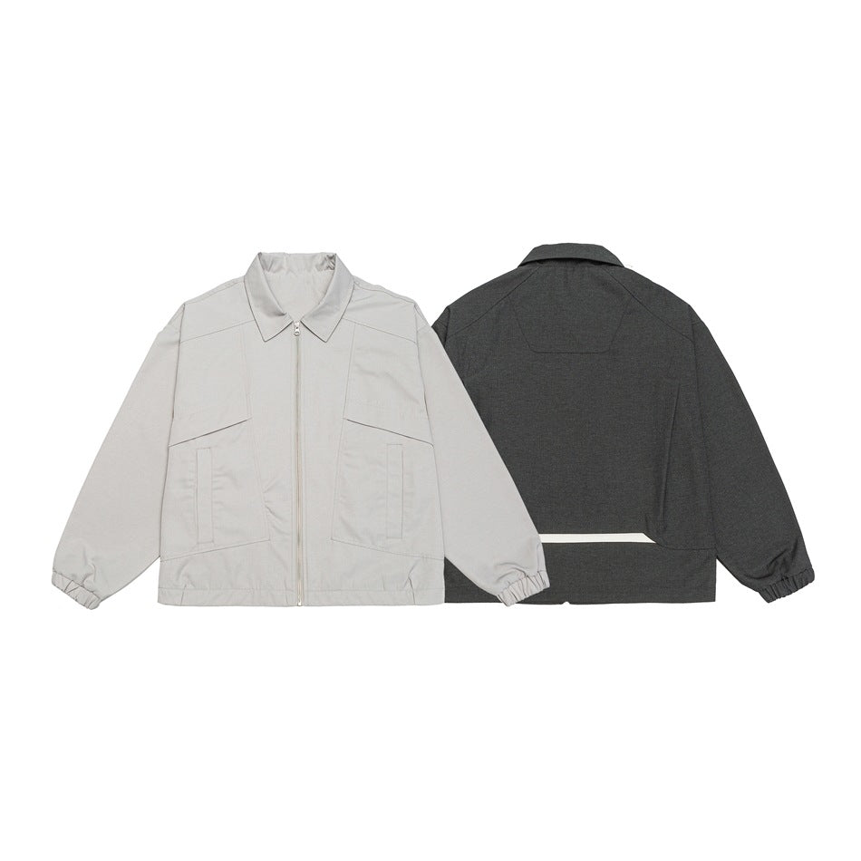 Light gray jacket shown from the front beside a charcoal version shown from the back.