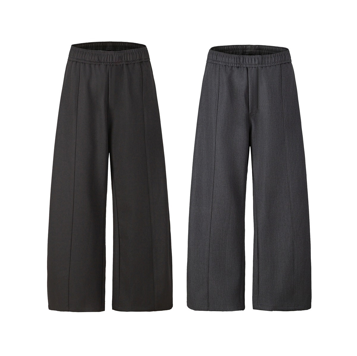 Two colorways of wide-leg trousers shown from the front: near-black and charcoal gray, both with elastic waists.