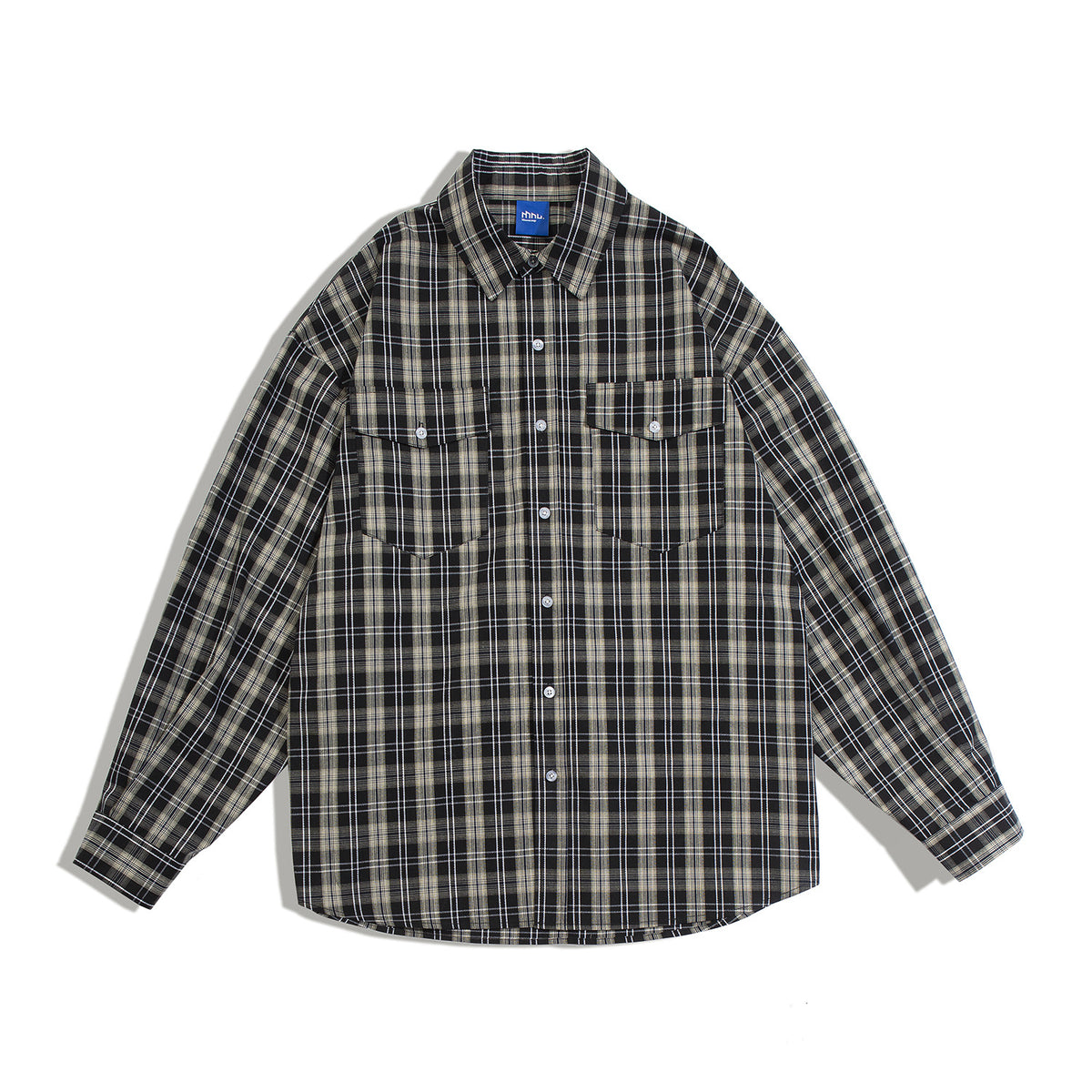 Black and beige plaid long-sleeve button-up shirt with two flap chest pockets, laid flat
