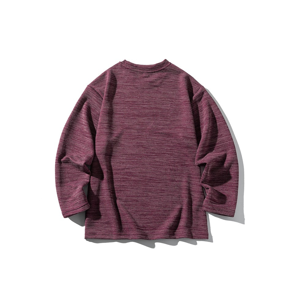 Flat-lay front of a burgundy heathered long-sleeve crewneck shirt on a white background.