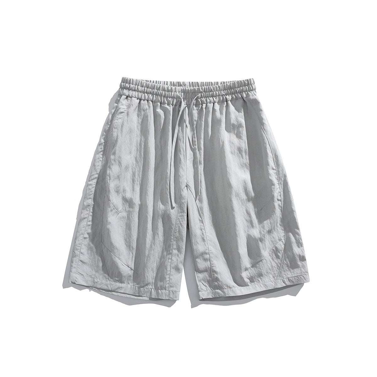 Light gray knee-length shorts with elastic drawstring waist and wrinkled texture, flat front view