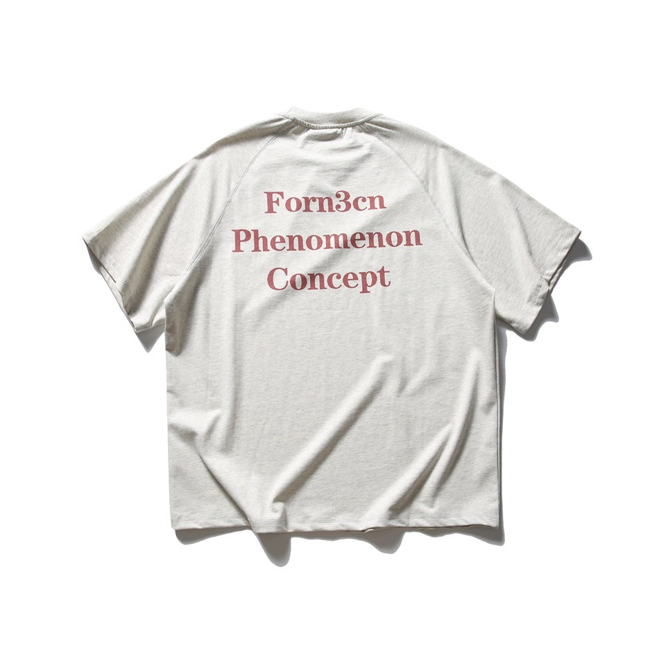 Back of light heathered gray raglan-sleeve T-shirt with red serif text print