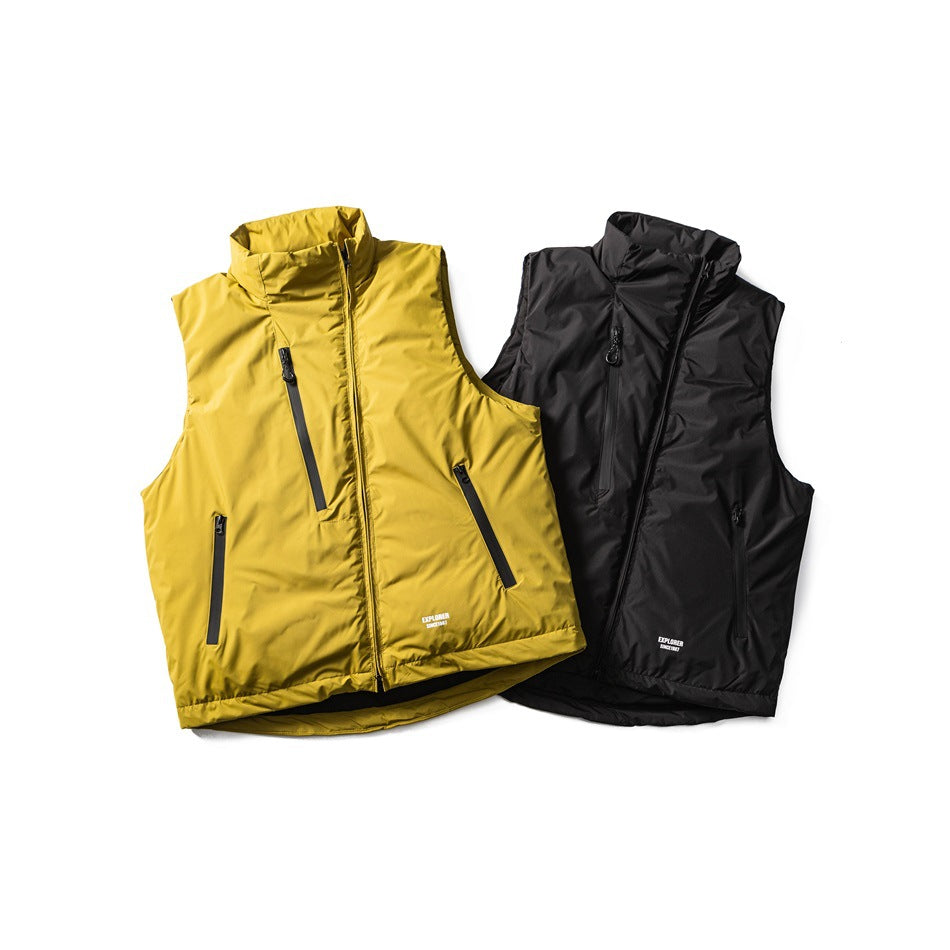Two sleeveless zip vests displayed together: one mustard yellow and one black, both with raised collars and zip pockets.