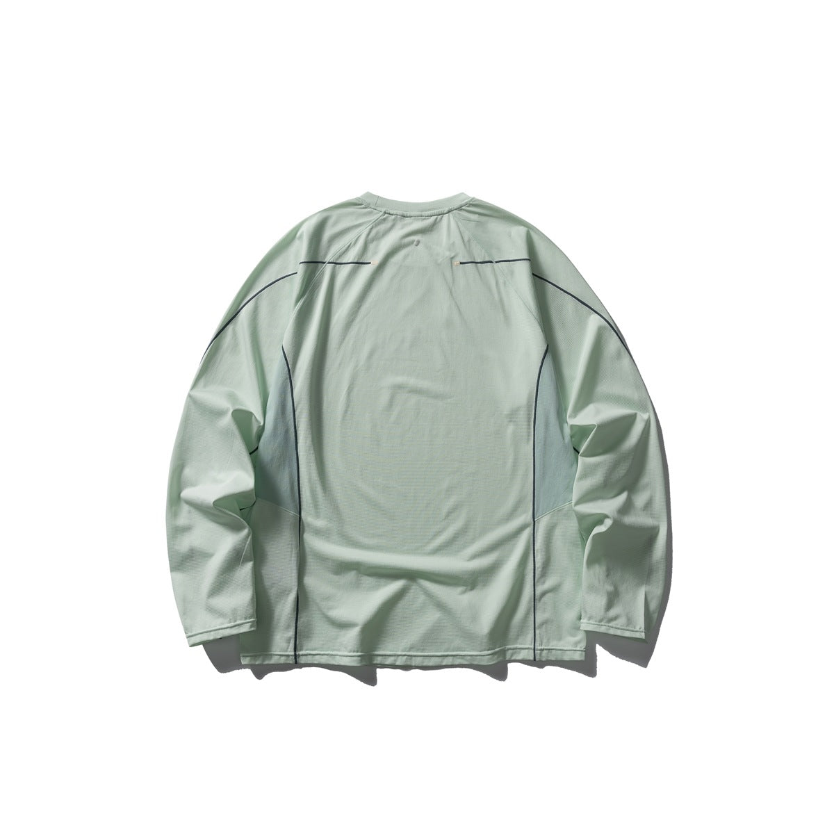 Back view of a pale mint long-sleeve crewneck shirt with dark curved piping and panel seams.
