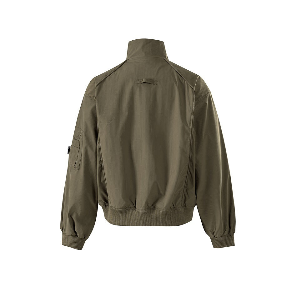 Back view of khaki green stand-collar jacket with raglan-style seams, ribbed hem and cuffs, and a sleeve pocket