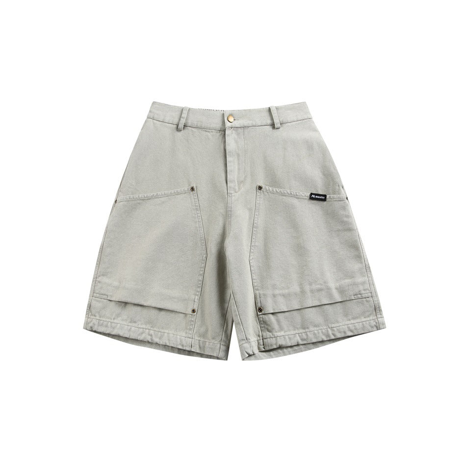 Light gray washed knee-length shorts with large front panel pockets, button fly and belt loops, flat front view