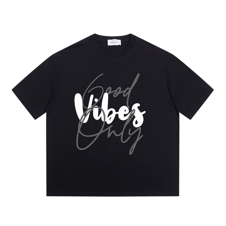 Black short-sleeve crew-neck T-shirt with white and gray 'Good Vibes Only' script graphic, flat front view
