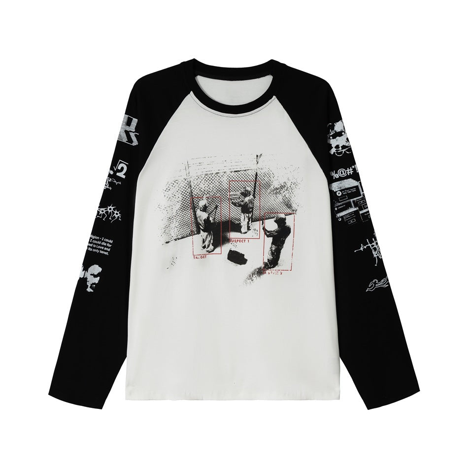 Black and white raglan long-sleeve top with black collar, chest graphic and white printed sleeve designs, flat front