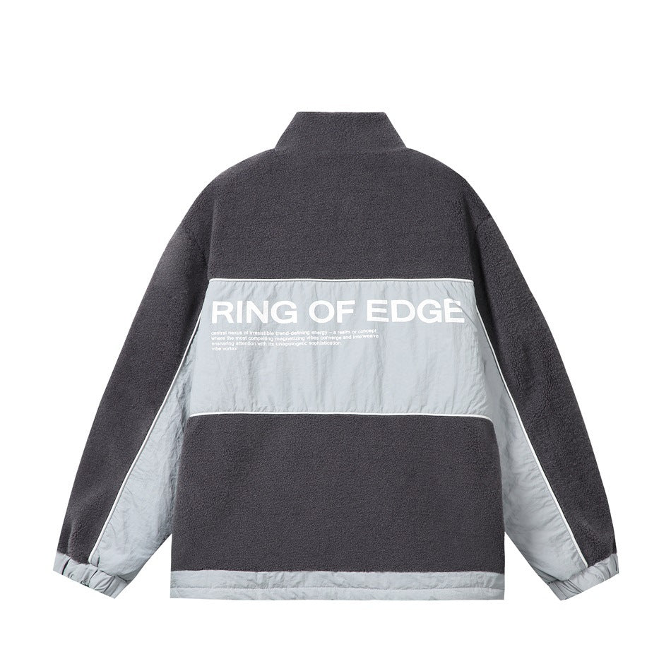 Back view of dark gray color-block jacket with a light gray panel and large white RING OF EDGE print