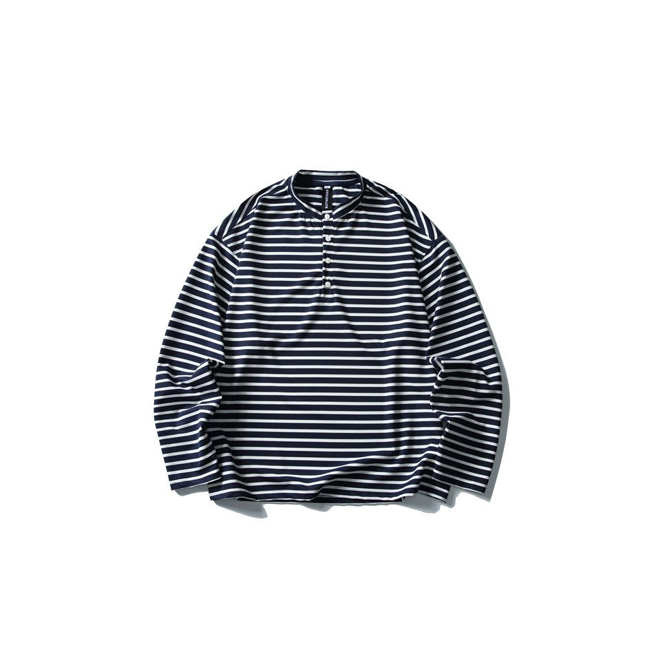 Navy and white striped long-sleeve top with stand collar and short button placket, flat lay front view