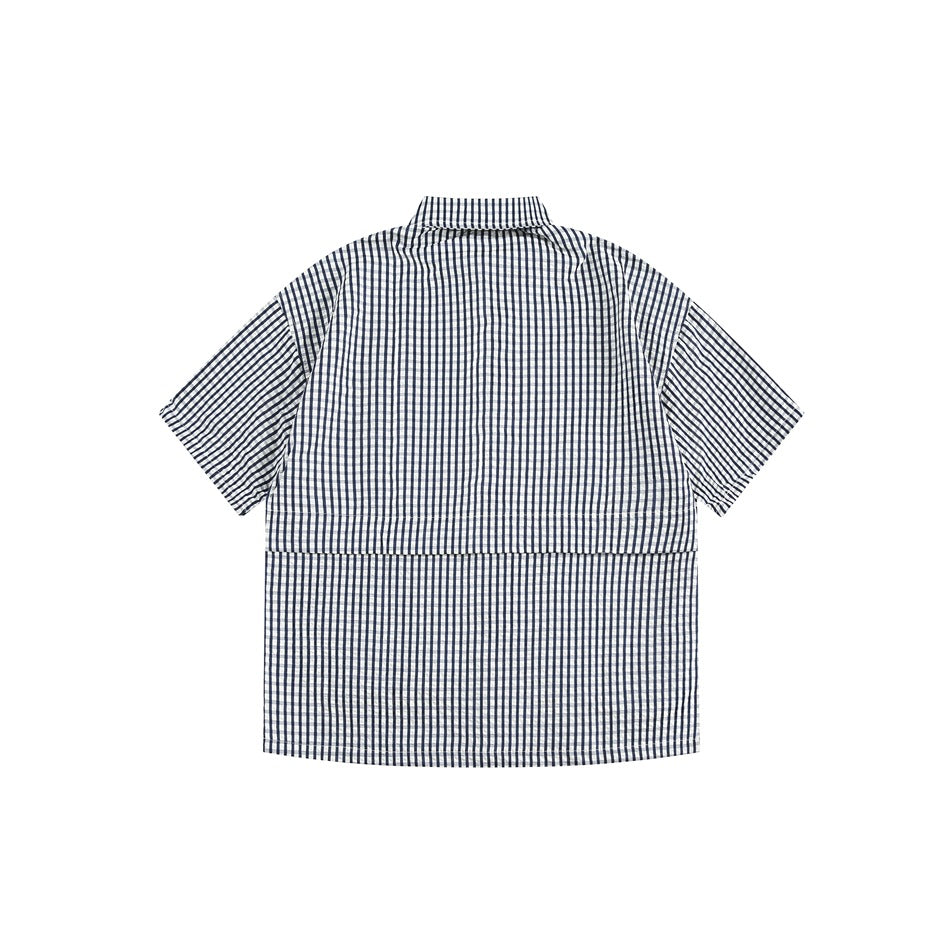 Navy blue and white gingham short-sleeve shirt, flat lay back view with horizontal seam across the lower back